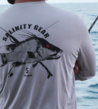 Salinity Gear performance SPF 50 sun protection dri-fit long sleeve fishing shirt. Grey shirt with screen printed ( reel vs steel ) hogfish fish rubbing or gyotaku design with crossed fishing pole and speargun on back. Screen printed distressed Salinity logo on front.